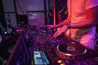 dj-playing-music-mixer